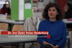 Screen still of Öykü interviewed.