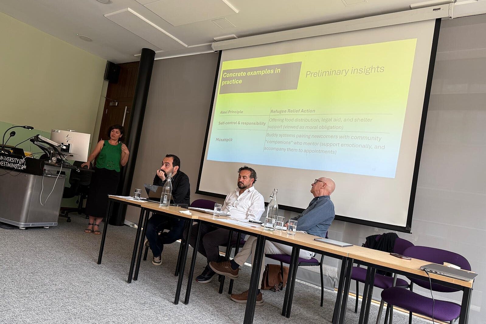 Öykü presenting research in London.