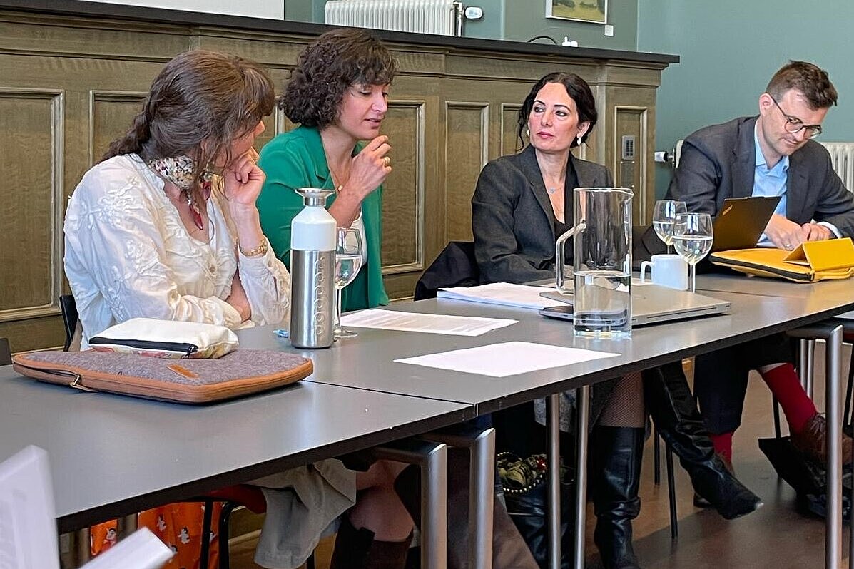 Photograph of participants at panel discussion in Lund