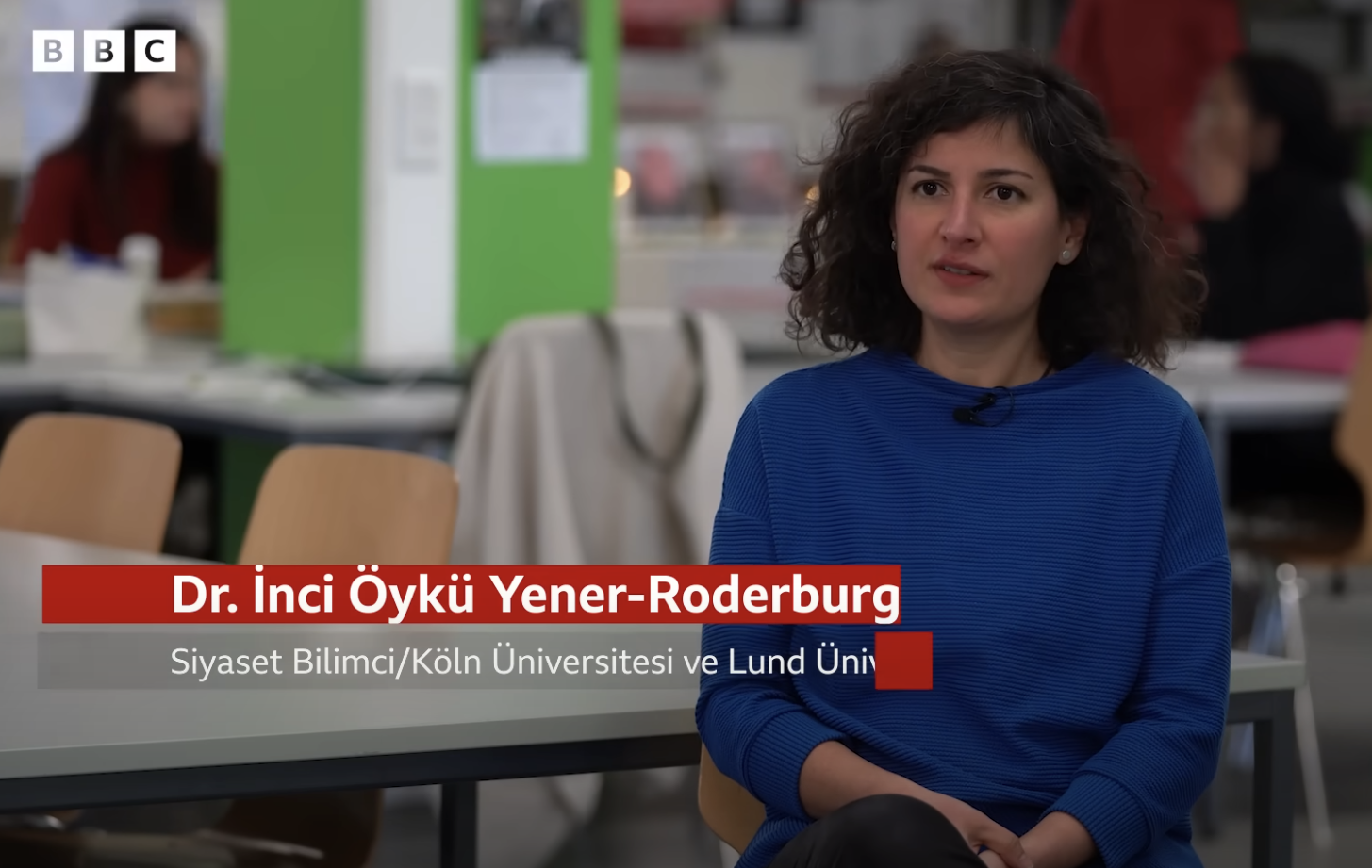 Screen still of Öykü interviewed.